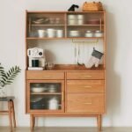 Prosy Kitchen Cabinet – Natural Wood with Glass Doors and Gold Handles