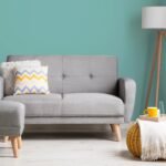 Éliane Convertible Sofa from natural wood legs & Tufted Backrest.