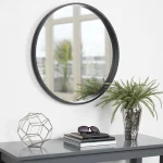 Round black wall mirror